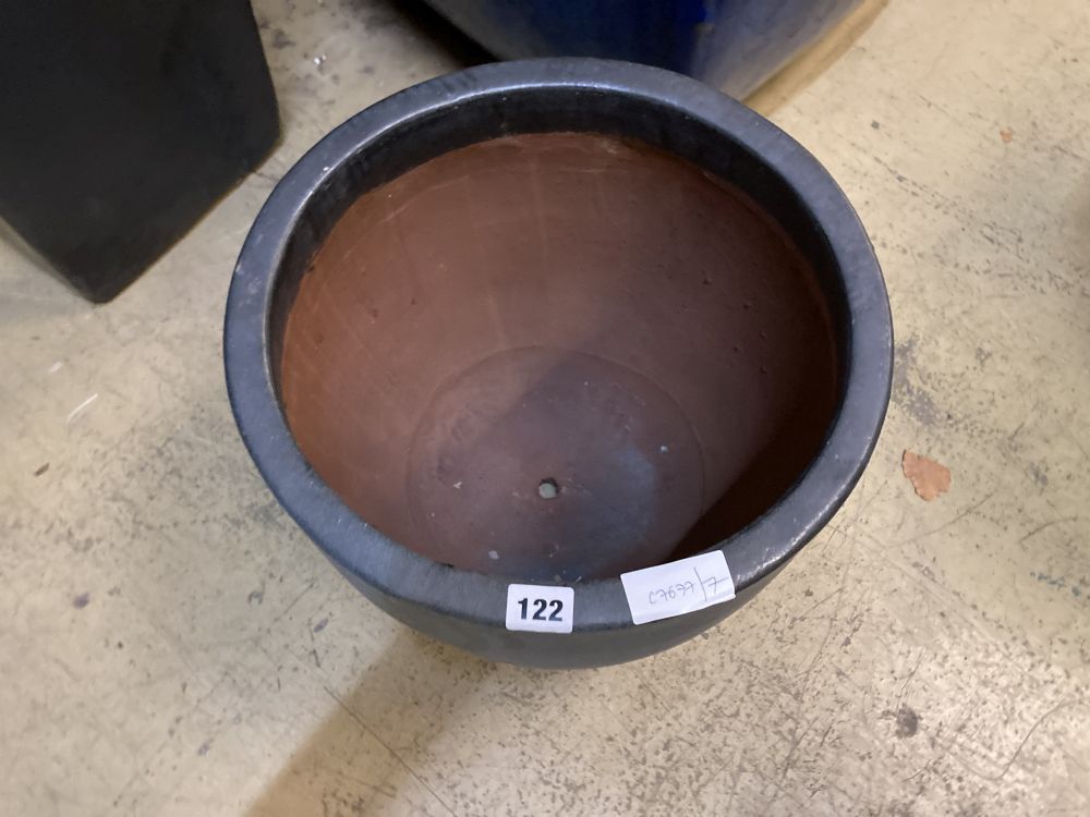 A circular grey glazed garden planter, diameter 36cm height 32cm